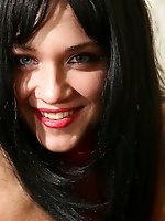 Dominatrix in red fishnet stockings.